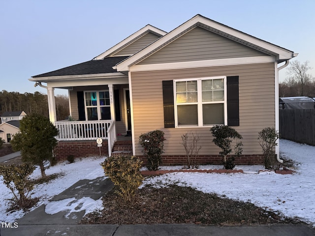 bungalow-style home featuring covered porch