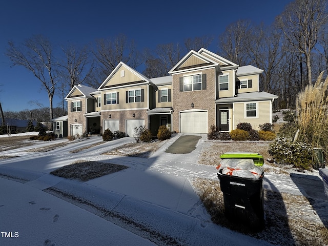 multi unit property featuring a garage