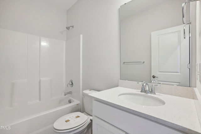 bathroom with shower / tub combination, vanity, and toilet