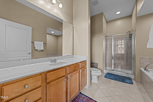 full bathroom with vanity, tile patterned flooring, plus walk in shower, and toilet