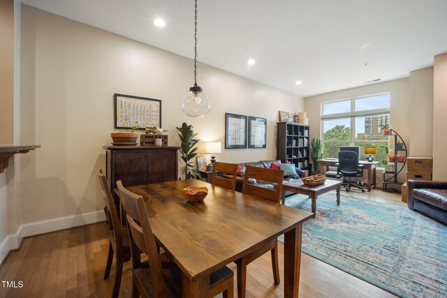 317 W Morgan St Unit 405, Raleigh, NC 27601 - dining area with wood finished floors and recessed lighting