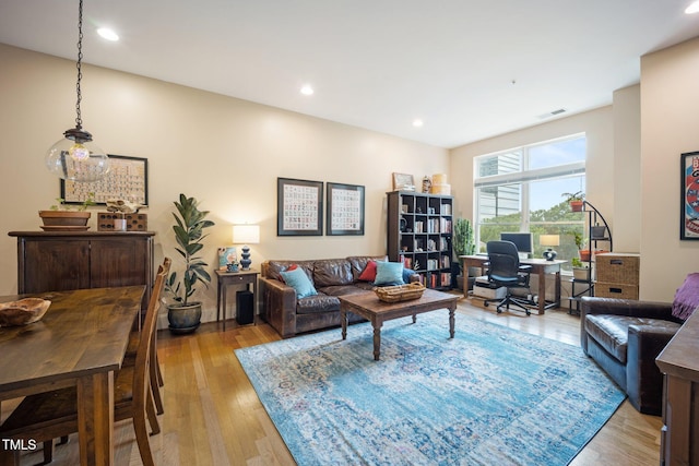317 W Morgan St Unit 405, Raleigh, NC 27601 - living room featuring a desk, light wood-style flooring, and recessed lighting
