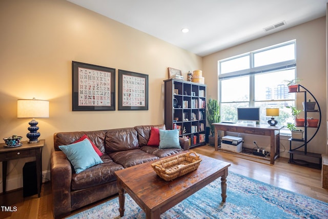 317 W Morgan St Unit 405, Raleigh, NC 27601 - living room with wood finished floors, recessed lighting, and a desk