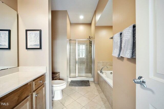 317 W Morgan St Unit 405, Raleigh, NC 27601 - full bathroom featuring tile patterned floors, vanity, a bath, and a shower stall