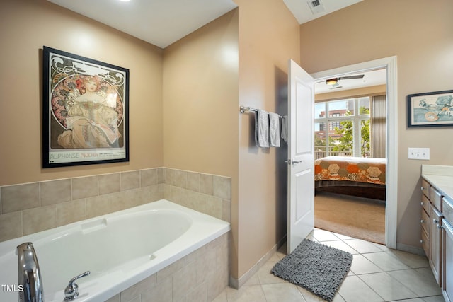 317 W Morgan St Unit 405, Raleigh, NC 27601 - bathroom with a garden tub, vanity, ensuite bath, and tile patterned flooring