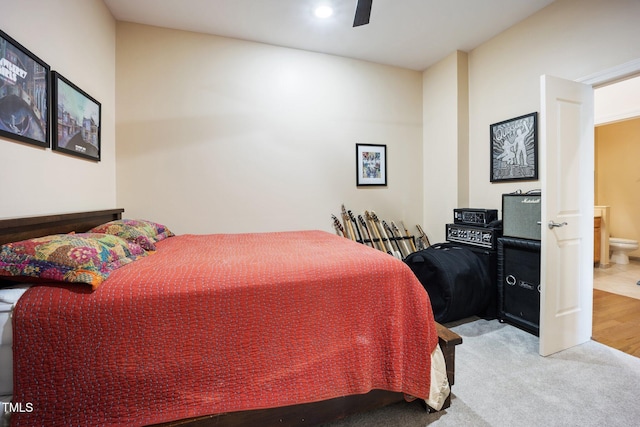 317 W Morgan St Unit 405, Raleigh, NC 27601 - carpeted bedroom featuring ceiling fan and ensuite bathroom