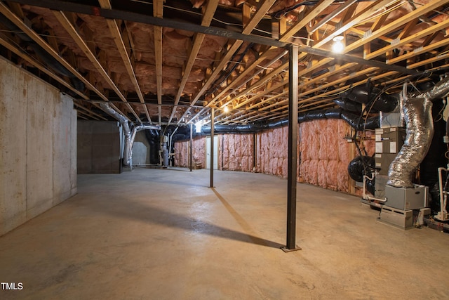 basement featuring heating unit