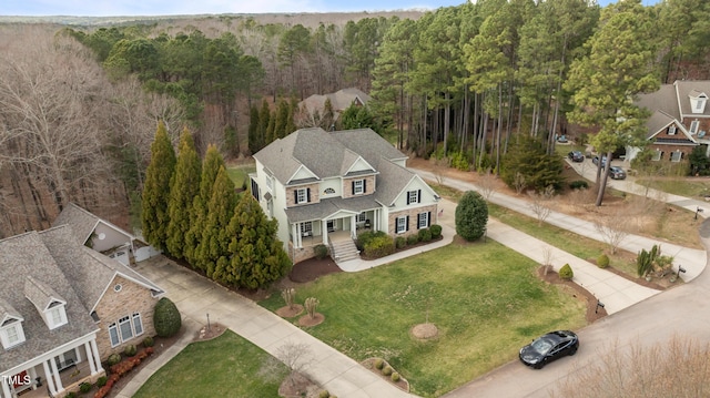 bird's eye view with a view of trees