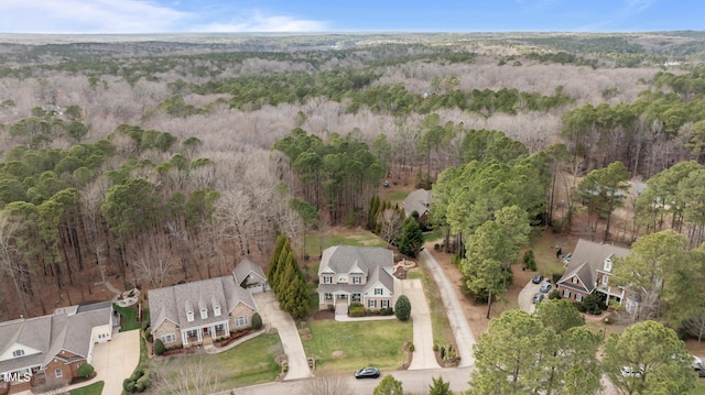 aerial view featuring a forest view