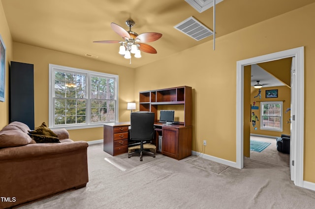 office with light carpet, attic access, visible vents, and baseboards