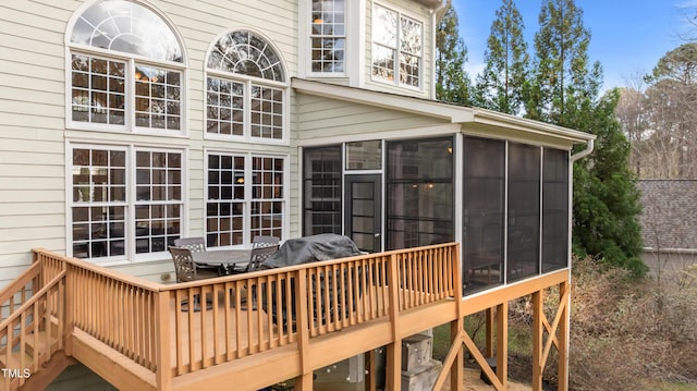 deck featuring a sunroom