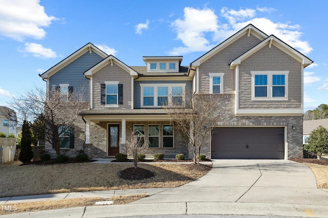 craftsman-style home with a garage and covered porch