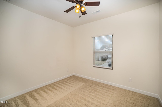 unfurnished room featuring carpet floors and ceiling fan