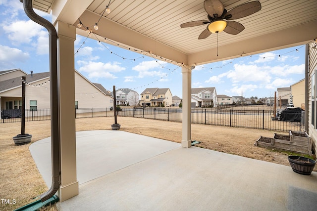 view of patio with ceiling fan and grilling area