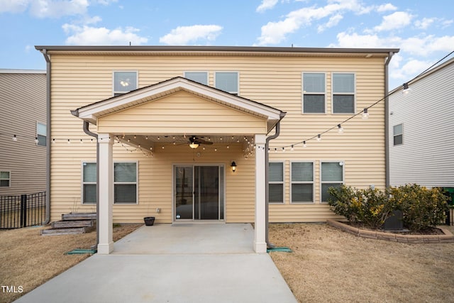 back of house featuring ceiling fan