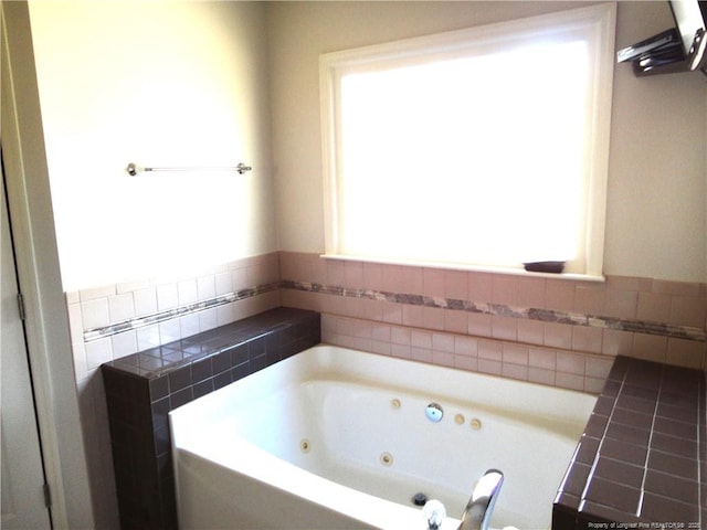 bathroom with a tub