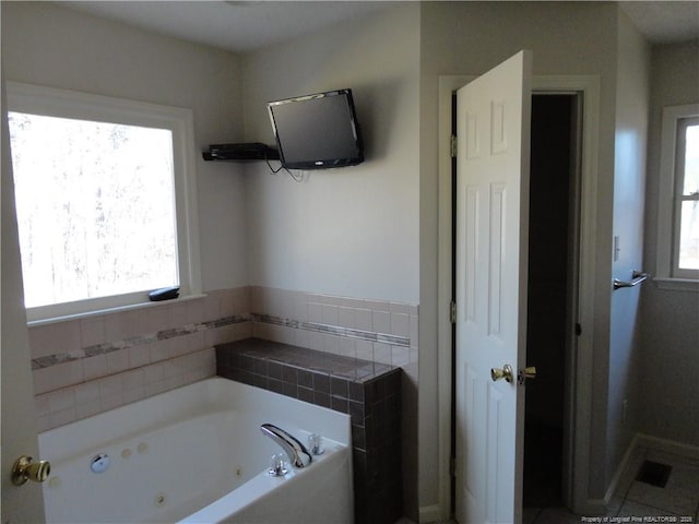 bathroom featuring a tub