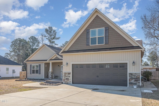 craftsman inspired home featuring a garage and covered porch