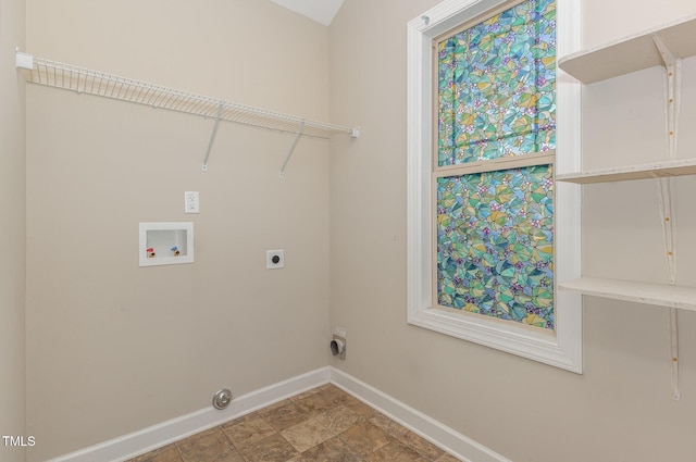 laundry room with washer hookup and electric dryer hookup