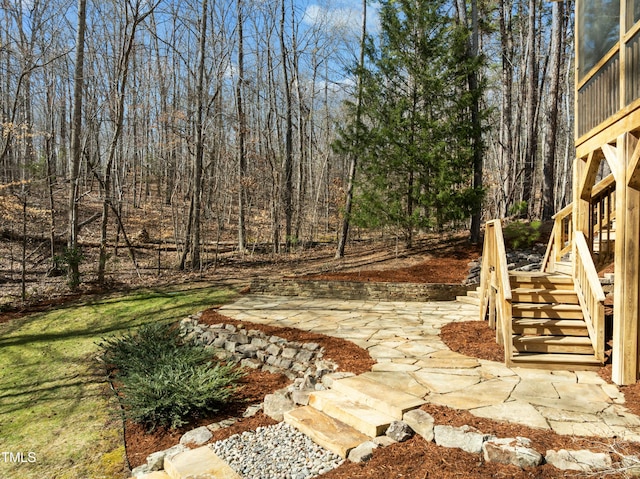 view of yard featuring stairway