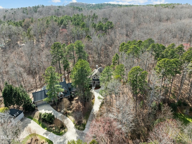 aerial view featuring a forest view