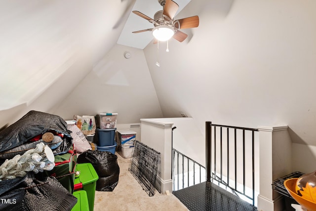 additional living space with vaulted ceiling, carpet floors, and ceiling fan