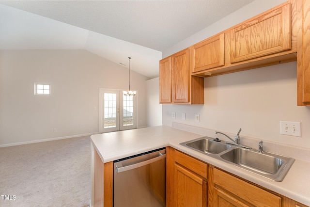 kitchen featuring sink, dishwasher, light carpet, vaulted ceiling, and kitchen peninsula