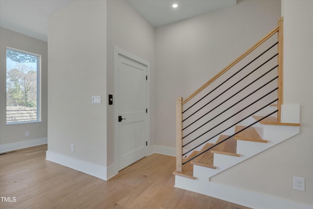 entrance foyer with light hardwood / wood-style flooring