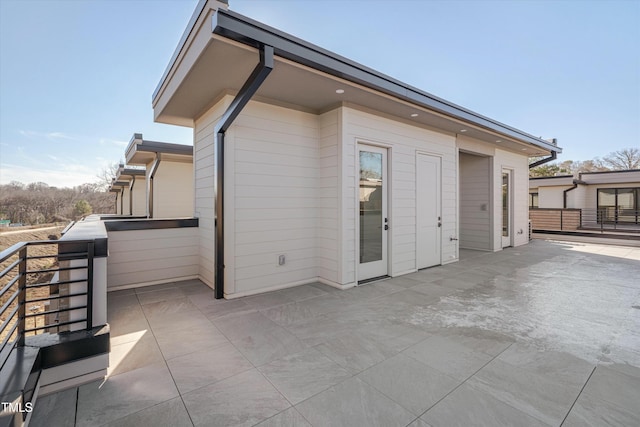 rear view of property with a patio area