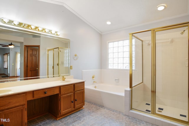 bathroom featuring vanity, ceiling fan, crown molding, and separate shower and tub