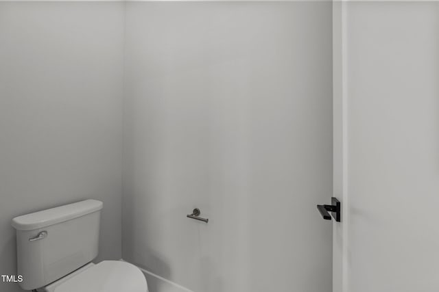 bathroom featuring toilet