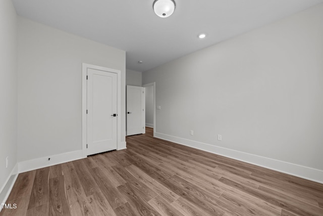 empty room with light wood-type flooring