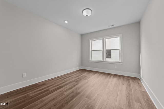 empty room featuring light hardwood / wood-style floors