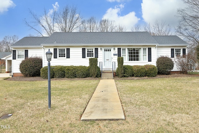 ranch-style home with a front yard