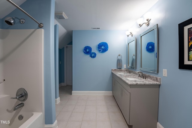 bathroom with vanity, tile patterned floors, and tub / shower combination