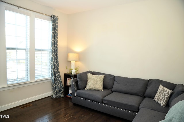 living room with dark wood-type flooring