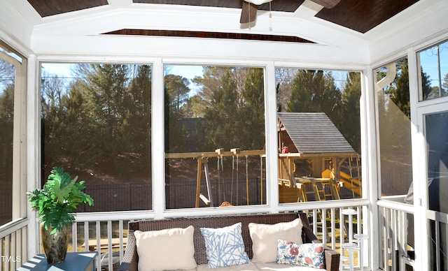 unfurnished sunroom with lofted ceiling