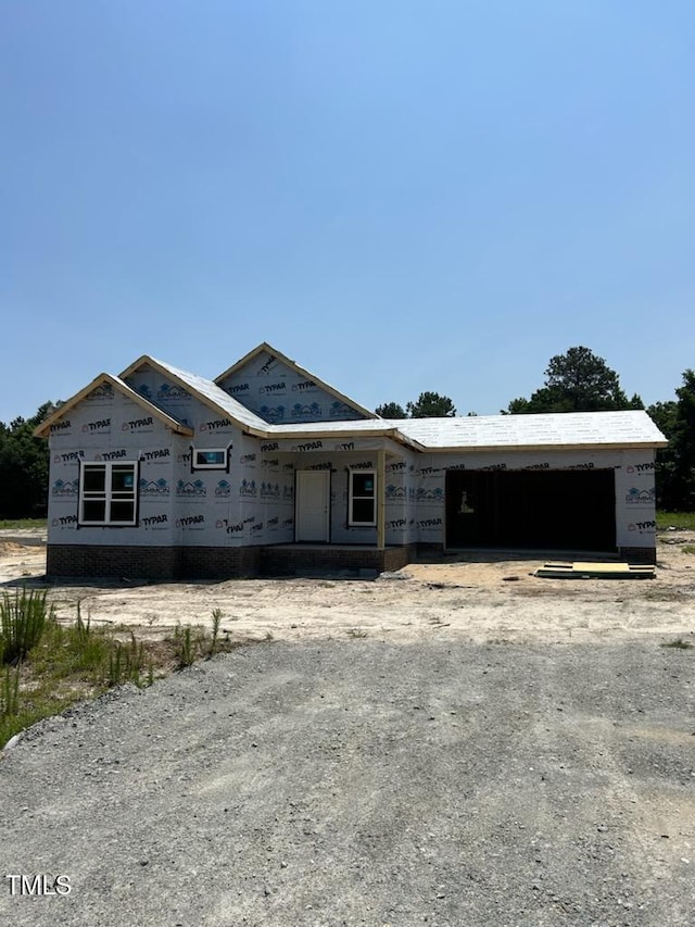 102 Sagewood Dr, Dudley, NC 28333 - property under construction with a garage