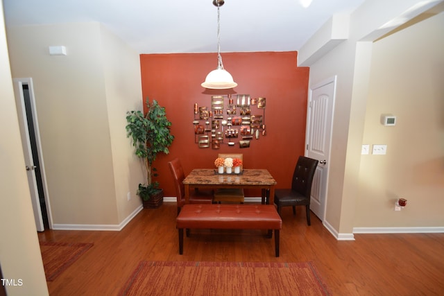 dining area featuring hardwood / wood-style floors