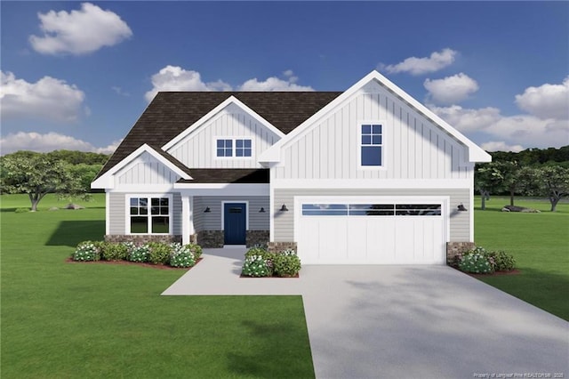 view of front of house with a garage and a front lawn