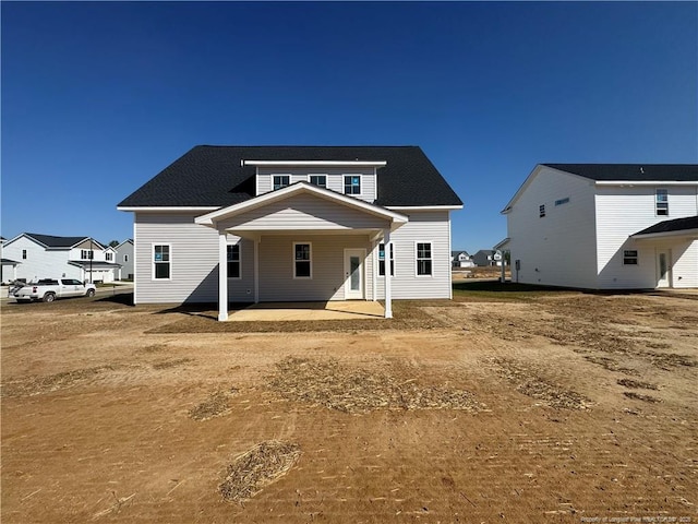 112 Peeler Cir, Raeford, NC 28376 - back of property with a patio area