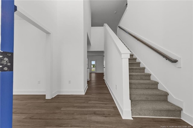 112 Peeler Cir, Raeford, NC 28376 - stairs featuring wood finished floors and baseboards