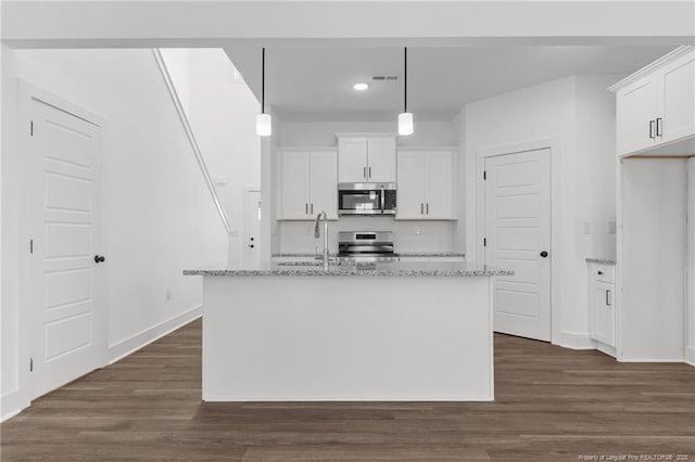 112 Peeler Cir, Raeford, NC 28376 - kitchen with stainless steel appliances, white cabinetry, dark wood-type flooring, and recessed lighting