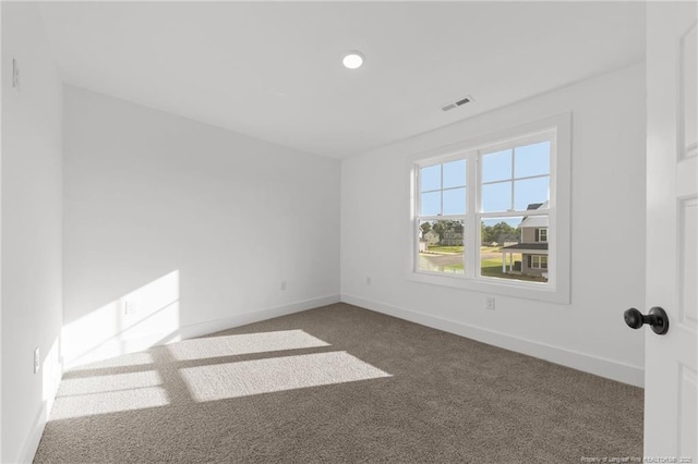 112 Peeler Cir, Raeford, NC 28376 - carpeted empty room featuring baseboards and recessed lighting