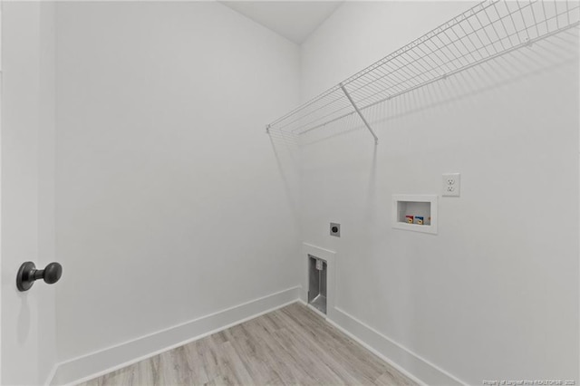 142 Peeler Cir, Raeford, NC 28376 - laundry area featuring washer hookup, hookup for an electric dryer, and light wood-style floors
