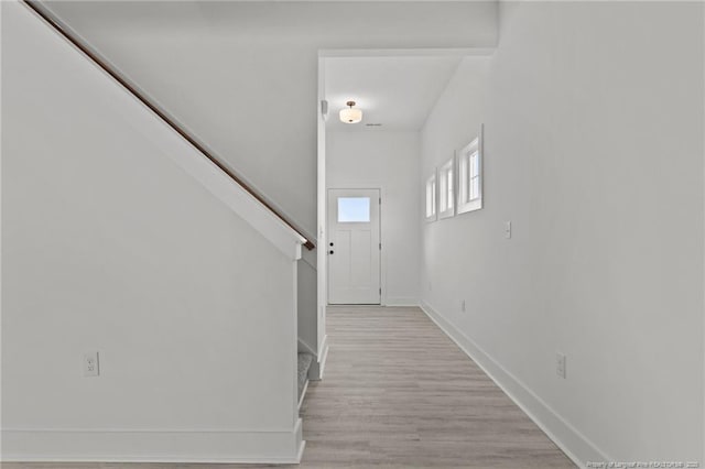 142 Peeler Cir, Raeford, NC 28376 - foyer entrance with stairway and light wood-style floors