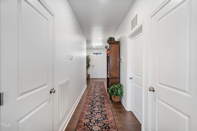 hall featuring dark hardwood / wood-style floors