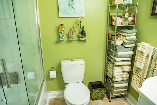 283 NC Highway 62 S, Yanceyville, NC 27379 - bathroom with baseboards and toilet