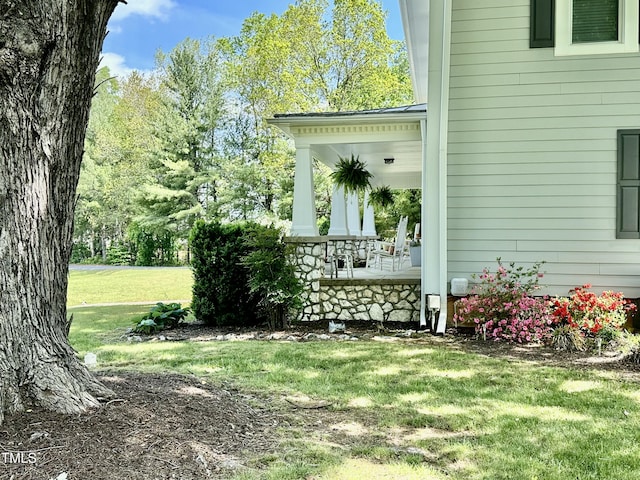 283 NC Highway 62 S, Yanceyville, NC 27379 - view of side of property featuring a lawn and a porch