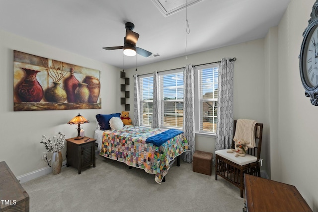 carpeted bedroom featuring ceiling fan